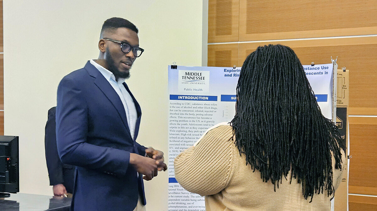 An MSTU Public Health Master Program student presenting his research.